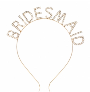 Detailed view of the gold rhinestone BRIDESMAID headband with sparkling crystal letters