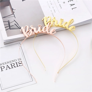 Set of gold and rose gold Bride to be alloy headbands with heart detail for weddings