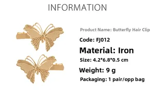 Detail view of two gold butterfly hair clips with 3D embossed textures on iron metal