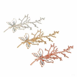 Trois barrettes libellules vintage avec strass brillants en or, argent et or rose