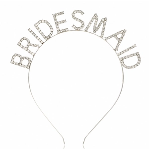 Detail of silver bridesmaid headband with glittering rhinestones for wedding hair accessory