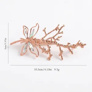 Vintage rose gold dragonfly hair clip with colorful crystal wings and branch design