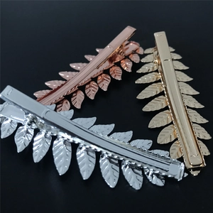 Three-piece leaf shaped metal hair clips set in gold, silver and rose gold colors