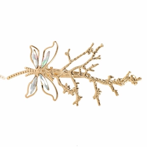 Golden dragonfly hair clip with iridescent wing inserts and detailed branch design