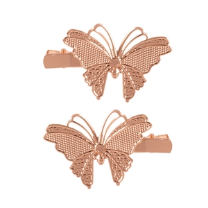 Pair of rose gold butterfly hair clips with hollow metal texture and duckbill structure