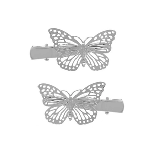 Paire de barrettes papillon argentées avec des ailes détaillées en métal évidé