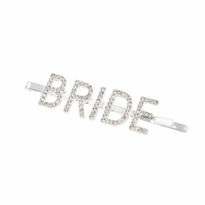 Detailed view of silver rhinestone bride hair clip for wedding bridal party accessories