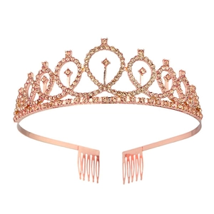 Detail of rose gold bridal crown with shimmering rhinestones and secure end combs