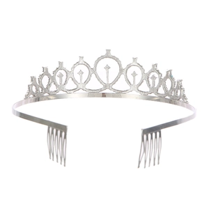 Detail of silver bridal tiara crown with hollow geometric patterns and side hair combs