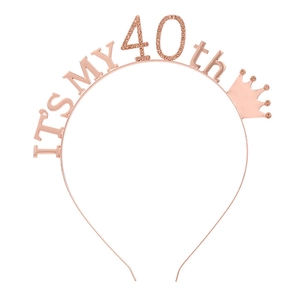 Detail of rose gold birthday headband with rhinestones and It's My 40th slogan