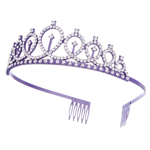 Detailed view of purple rhinestone bridal crown with side combs for secure styling