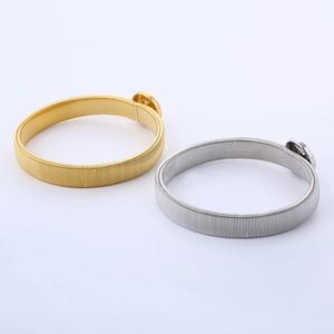 Adjustable spring armbands in gold and silver metal for shirt sleeves with DIY base
