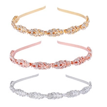Detailed view of leaf-shaped bridal headbands in gold, silver, and rose gold with crystals