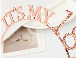 Close-up of rose gold 18th birthday headband with sparkling hand-set rhinestones
