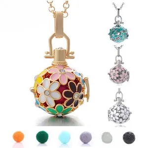 Hollow floral diffuser pendant necklace with colorful enamel and assorted felt balls