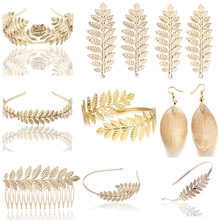 Detailed set of golden laurel leaf headbands, hairpins, and greek style accessories