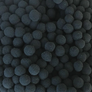 Close-up of 16mm black cotton balls for perfume diffuser pendants and DIY crafts