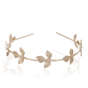 Elegant gold leaf headpiece for brides with metallic finish on a white background