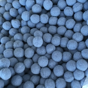 Pile of 16mm grey felt wool balls for essential oil diffuser pendant and DIY jewelry