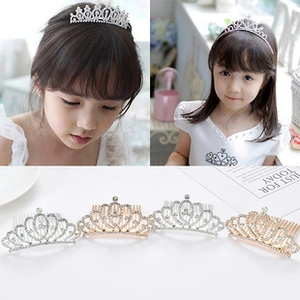 Detail of crystal rhinestone leaf hair combs for girls in silver and gold finishes
