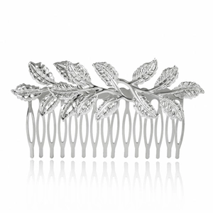 Silver bridal hair comb with elegant metal leaf and branch design on white background
