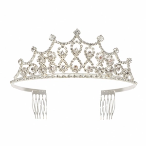 Detail of silver bridal tiara with sparkling rhinestones and integrated hair combs