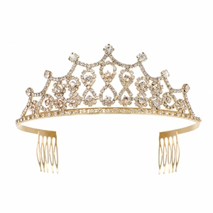 Macro detail of gold bridal tiara with sparkling rhinestones and side hair combs