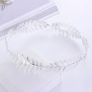 Elegant silver laurel leaf crown headband for brides in a minimalist Greek goddess style
