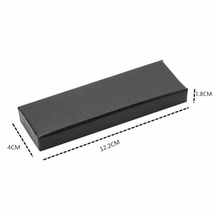 Macro view of a rectangular black jewelry gift box with textured finish and 12.2x4x1.8cm dimensions