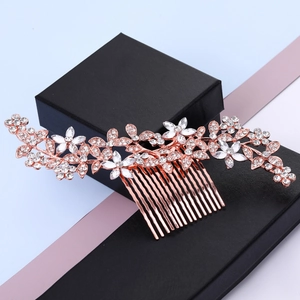 Elegant rose gold bridal leaf hair comb with crystals and rhinestones for wedding styling