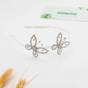 Silver crystal butterfly headband for girls with sparkling rhinestones for celebrations