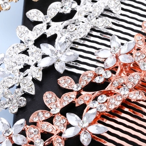 Macro view of crystal floral hair comb with silver and rose gold rhinestone leaves
