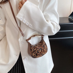 Brown leopard print crescent bag with cute bows and delicate white lace detailing