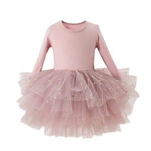 Detailed view of layered pink mesh tutu skirt with gold sequin stars and moon patterns