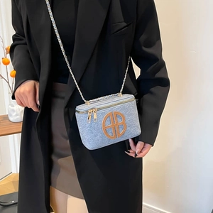 Light blue denim square crossbody bag with brown leather AB monogram and gold chain strap