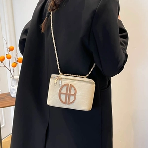 Chic beige square crossbody bag with gold chain and letter cutout for women