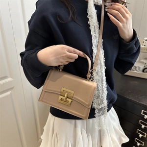 Elegant beige minimalist square crossbody bag with stylish gold metal buckle detail