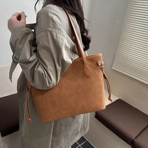 Chic brown suede tote bag for women featuring vintage style and side drawstring detail
