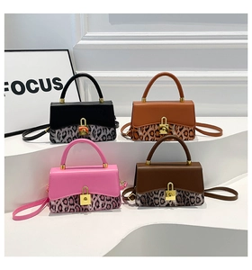 Detail showing colorful retro crossbody bags with leopard print texture and gold locks