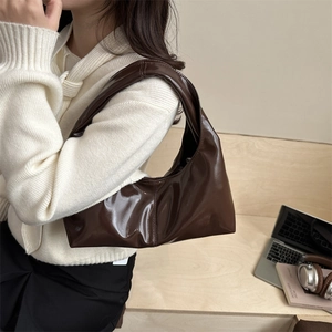 Retro coffee brown patent leather tote bag in a minimalist chic commute style