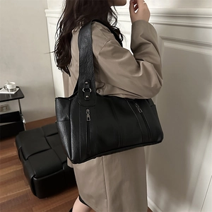 Black large capacity faux leather tote bag with lychee texture and wide shoulder strap