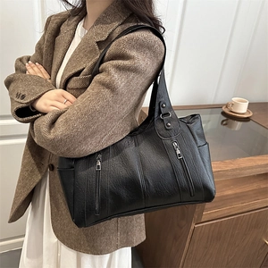 Black large capacity tote bag with lychee texture and metallic zippers on the front