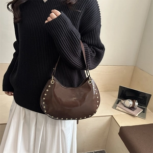 Dark brown high-gloss crescent moon shoulder bag with silver rivet studs for women