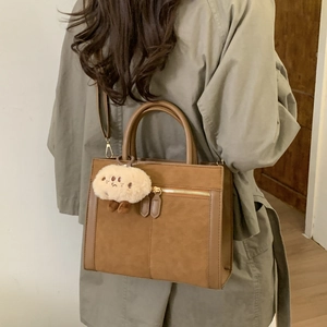 Retro brown crossbody square bag with plush potato charm and adjustable strap for women
