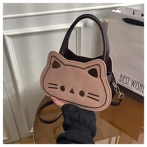 Détails du sac à main en forme de chat avec broderie et finitions métalliques