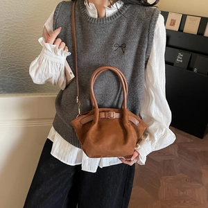 Retro brown frosted leather handbag with accordion design and round handle for daily use