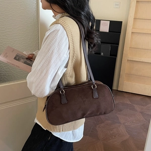 Vintage dark brown suede underarm bag with zipper closure and slim leather straps