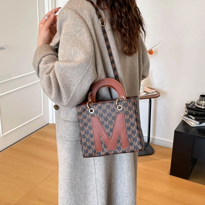 Chic small square tote bag with letter M print and brown leather accents for women