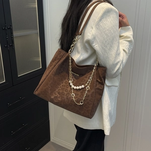 Brown leopard print tote bag with pearl chain and floral pendants for women