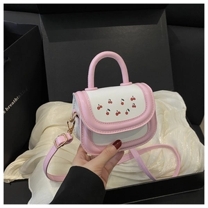 Pink and white cherry print mini bag inside a luxury gift box with silky lining